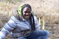 bothin-venetia-valley-student-smiling-planting-around-flags
